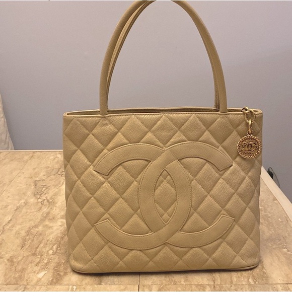 CHANEL Handbags - CHANEL Beige Authentic Vintage Caviar Medallion CC Tote-EUC with COA